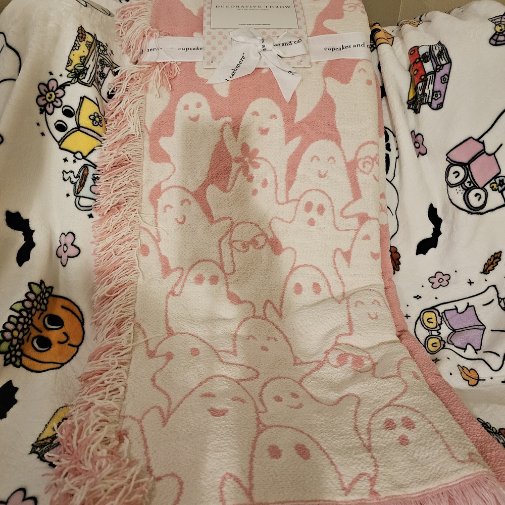 cupcakes & cashmere Pink and White Ghost Throw Blanket